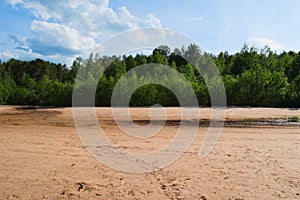 Green forest and red sand.