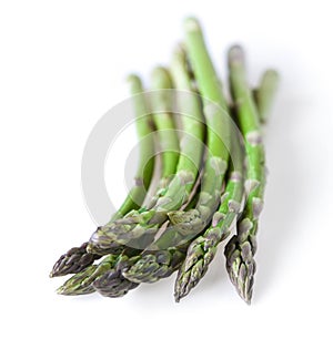 Green fresh asparagus on a white background. Copy space