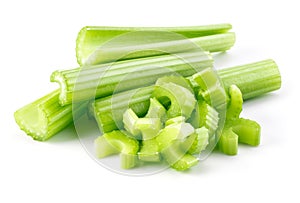 Green fresh celery sticks and pieces isolated on white