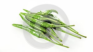 Green fresh hot spice chili pepper closeup isolated on a white background with clipping path. Studio light shot. Concept of