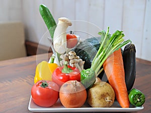 Green fresh vegetables with tomatoes, carrot, chili, mushroom, p