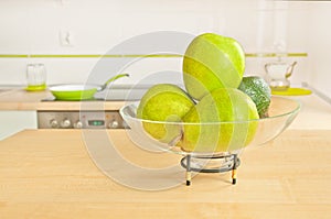 Green fruits in modern kitchen