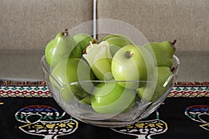 Green Fruits over a Portuguese Placemat