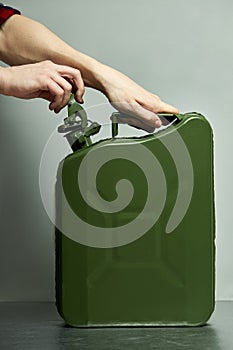 Green fuel container jerrycan isolaed.canister for gasoline, diesel gas.Fire resistant storage tank.