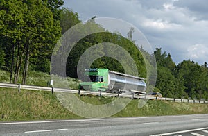 Green fuel truck and forrest