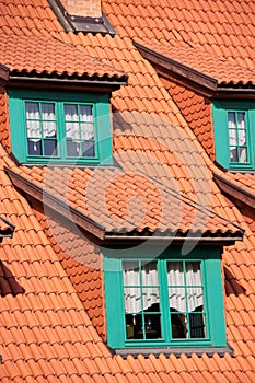 Green gables red tile roof