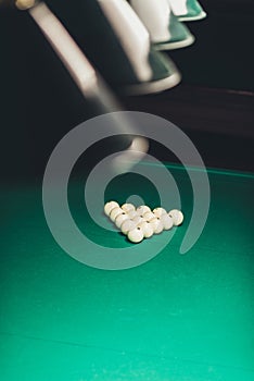 green gambling table with balls