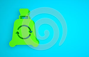 Green Garbage bag with recycle symbol icon isolated on blue background. Trash can icon. Recycle basket sign. Minimalism