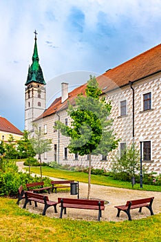 Green garden at Church of the Assumption of the Virgin Mary in Jindrichuv Hradec, Czech Republic