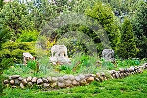 Green garden with elephant statues