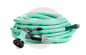 Green garden hose on a white background