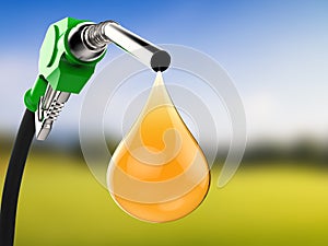 Green gas pump nozzle with droplet of oil