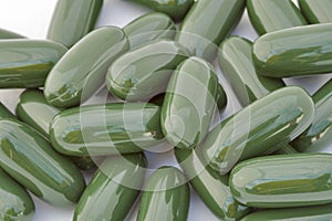 Green gelatinous capsules background