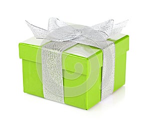 Green gift box with silver ribbon and bow