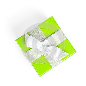 Green gift box with silver ribbon