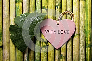 Green Gingko Leaf And Heart On Bamboo