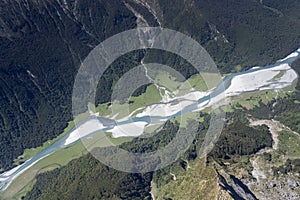 Green glades and pebbly riverbed at Wilkin river, from above, New Zealand