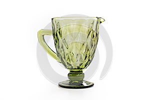 green glass carafe for drinks. tableware for the dining room.