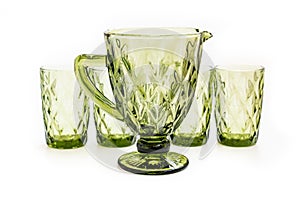 green glass carafe for drinks. tableware for the dining room. set of tableware