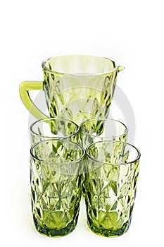 green glass carafe and glasses for drinks. set of tableware