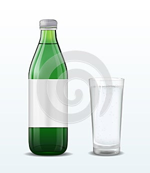 Green glass mineral water bottle on white background