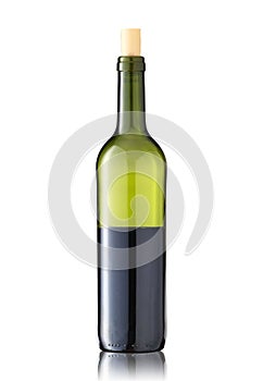 Green glass wine bottle half full