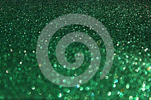 Green glitter background - defocused lights or bokeh background