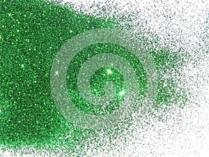 Green glitter sparkle on white background