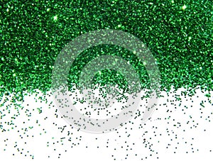 Green glitter sparkle on white background