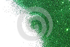 Green glitter sparkle on white background
