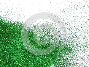 Green glitter sparkle on white background