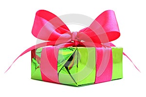 Green glossy gift wrapped present with pink satin bow