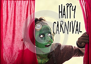 Green goblin behind a red grand drape, text happy carnival