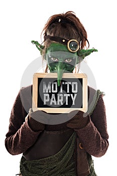 Green Goblin holding a slat with german text, theme party
