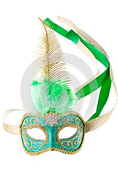 Green and gold feathered carnival mask