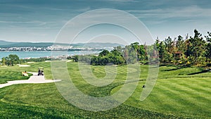 Green Golf Course With Scenic Sea View