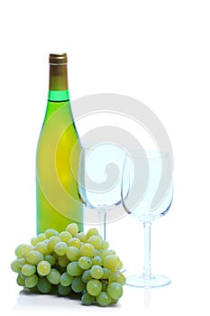 Green grape cluster and wine