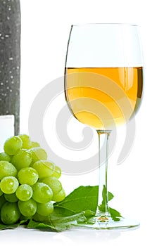 Green grape cluster and wine