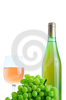 Green grape cluster and wine