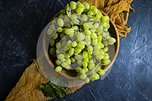 Green grapes on concrete backgroundn natural healthy photo