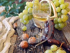 Green grapes and glass of white wine