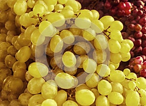 Green grapes for sale at a market photo