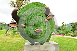 Green grass bull statue