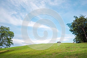 Green grass on the hills with clear blue sky, Doi Samer Dao