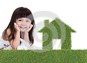 Green grass house with girl