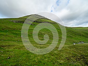 Green grass slope of mountain