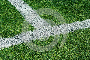 Green grass soccer field background, close-up top view