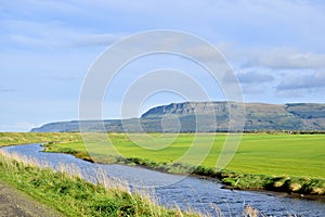 Green grasses perfect lawn mowing gardening agriculture mountain binevenagh long grass cut limavady stream river blue skies clouds