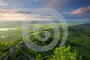 Green grassland and storm cloud