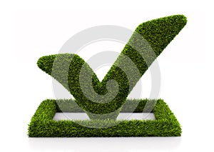 Green grasssy check mark symbol in the circle on white background photo